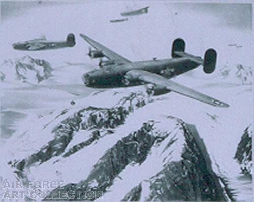 FLIGHT OF BOMBERS FLYING OVER SNOW COVERED MOUNTAINS